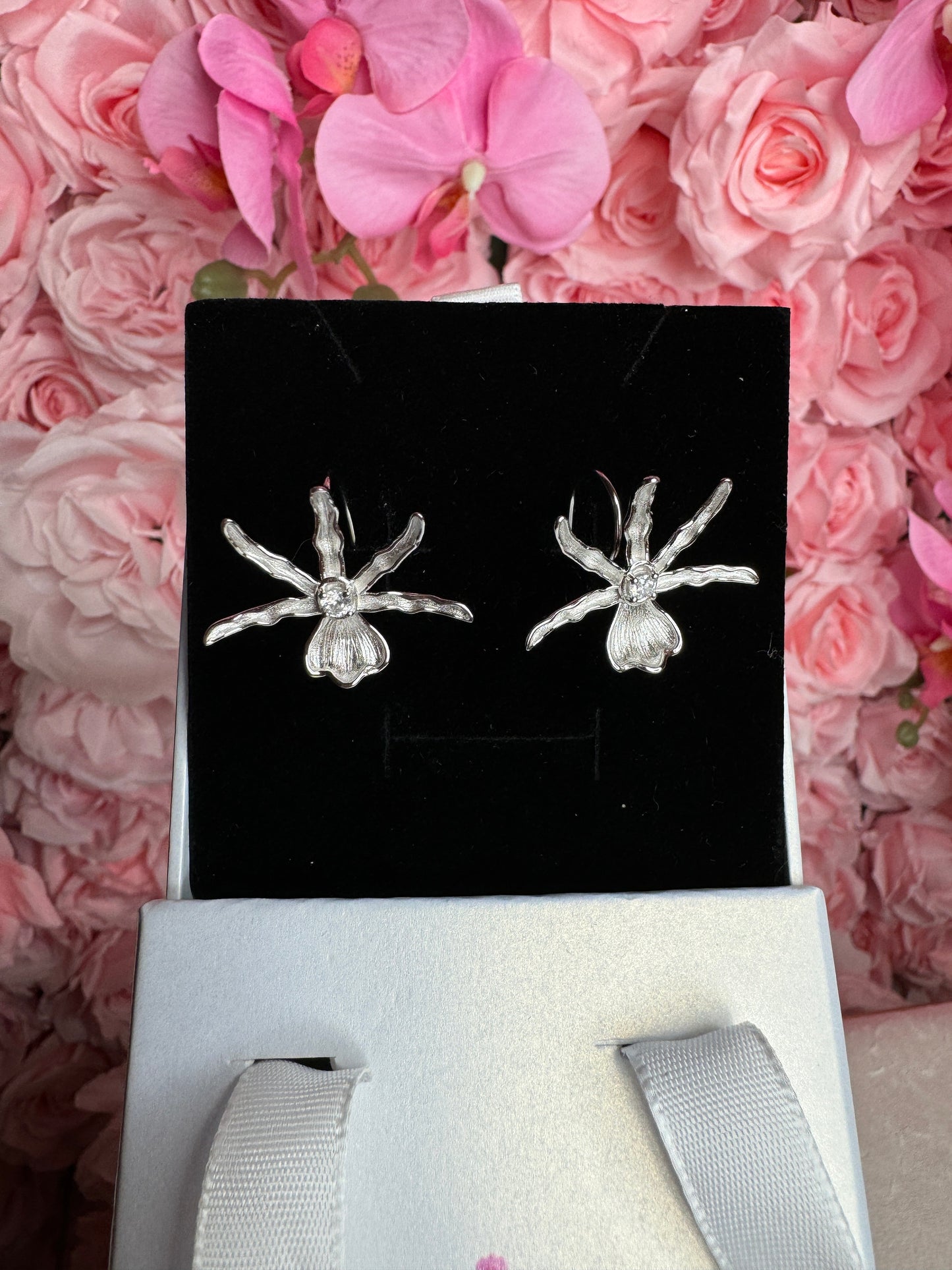 Schomburgkia Silver Orchid Dangle Earrings β’ Sterling Silver Orchid Earrings with Arching Hoop β’ Unique Floral Jewelry