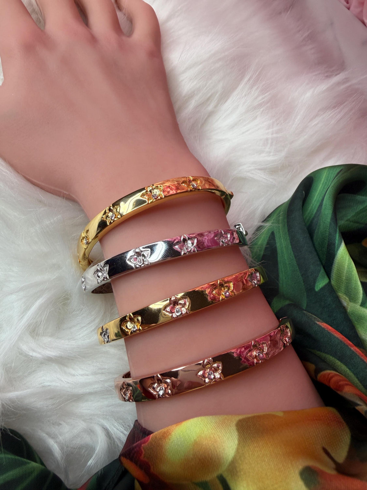 cattleya orchid bracelet, 14K gold plated sterling silver, stacked on wrist with other bangles – Orchidique