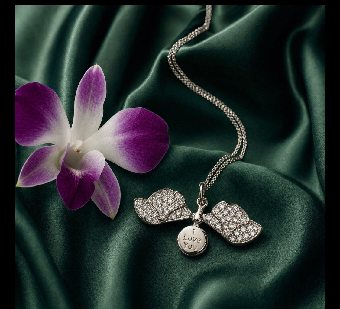 White Gold Dendrobium orchid locket necklace with pave petals and secret message engraving