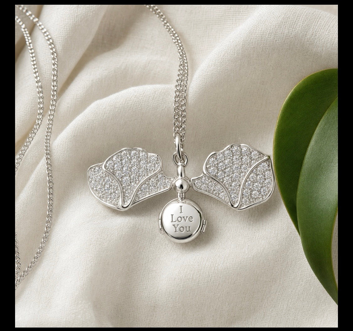 White Gold Dendrobium orchid locket necklace with pave petals and secret message engraving