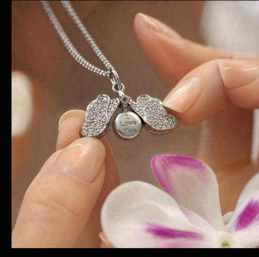 White Gold Dendrobium orchid locket necklace with pave petals and secret message engraving
