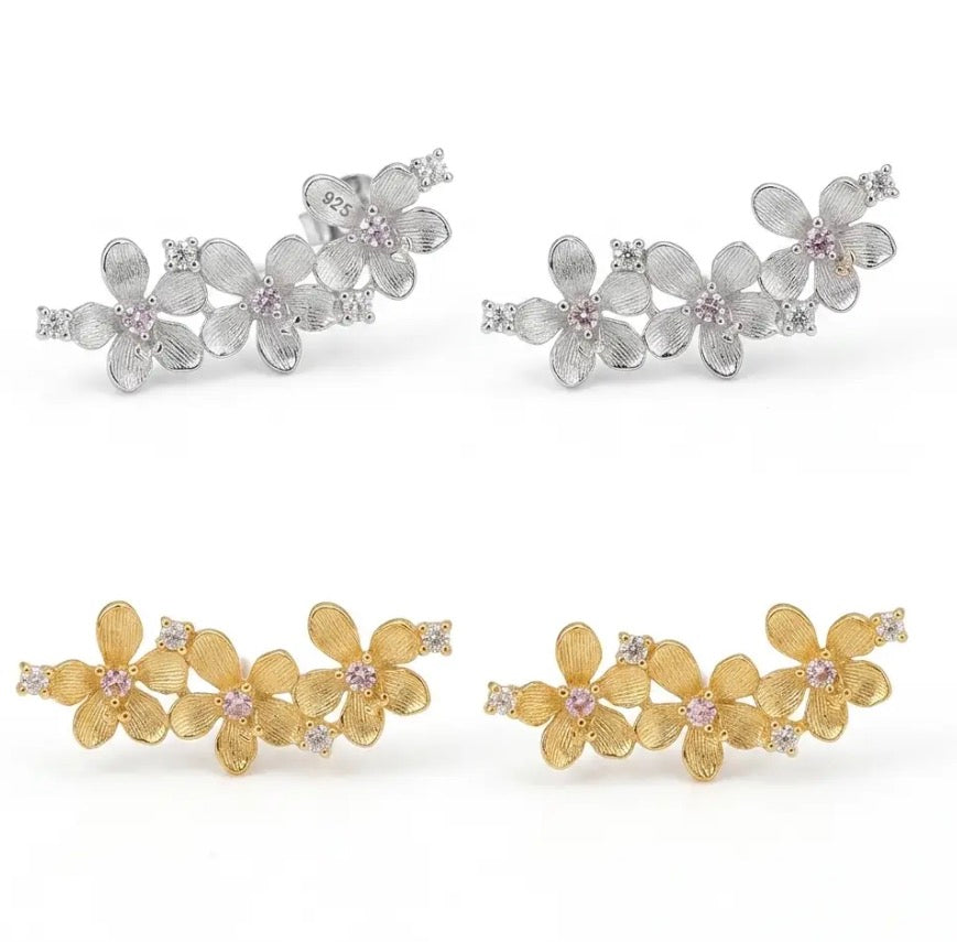 Vanda Loke Ear Climbers in silver and gold side by side • orchid flower climber earring color comparison