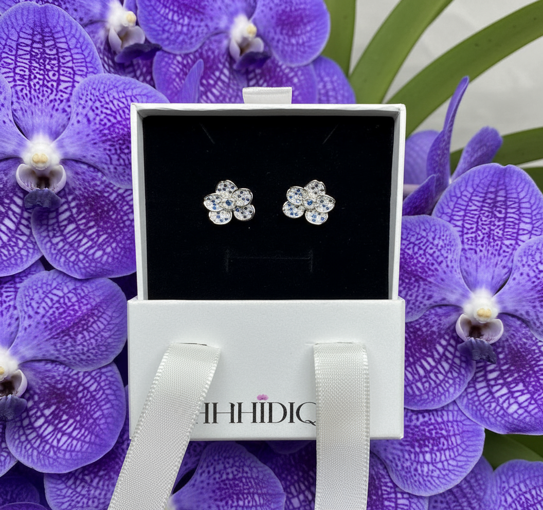 Shimmer me Vanda Collection: White Gold Studs with Sapphire Zircons