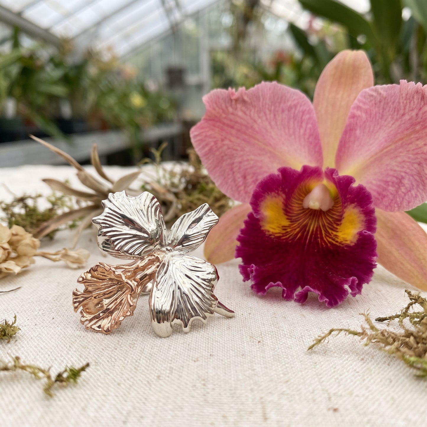 Drama Cattleya Dowiana Statement Ring on White Marble - Orchidique