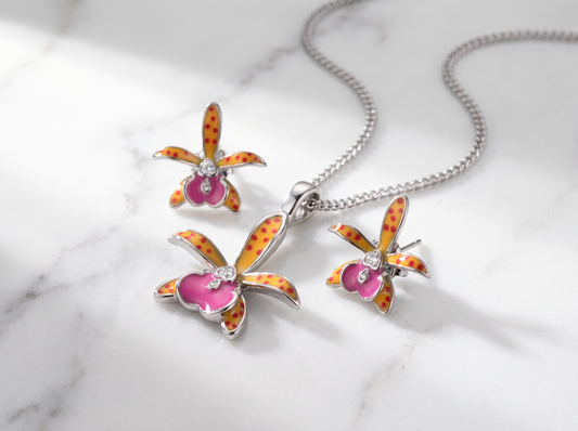 Small World Hippodamia Orange Orchid Necklace & Earrings on White Marble - Orchidique