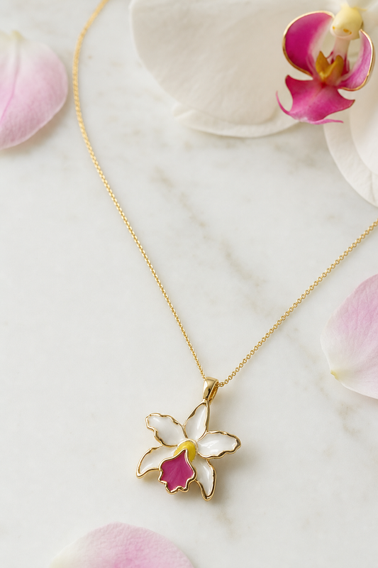 La Colombiana Collection White & Pink Cattleya Orchid Necklace on white marble - Orchidique