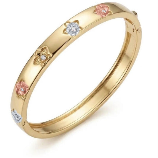 Tri-color Cattleya orchid hinged bangle, gold band with gold, rose gold and white blooms and zircons