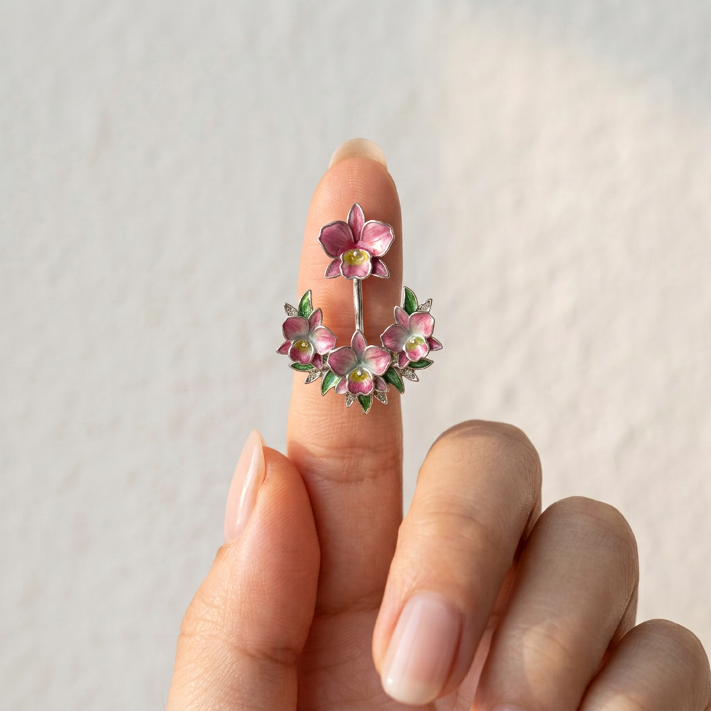 cattleya orchid stud earrings, pink enamel, 14K gold plated sterling silver, on fingertip – Orchidique