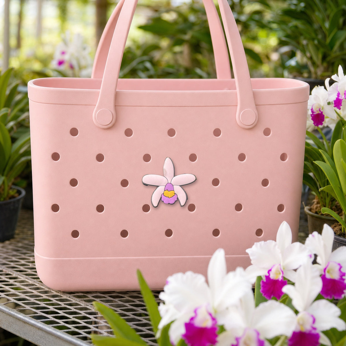Blush Cattleya orchid PVC tote bag charm on pink tote with orchids
