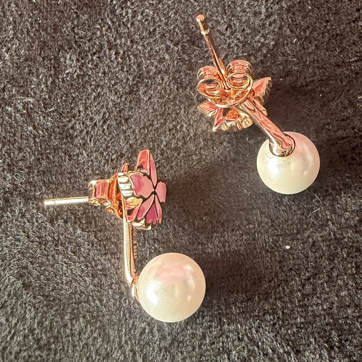 cattleya orchid stud earrings, pearl, pink enamel, 18K gold plated sterling silver, pair on dark fabric – Orchidique