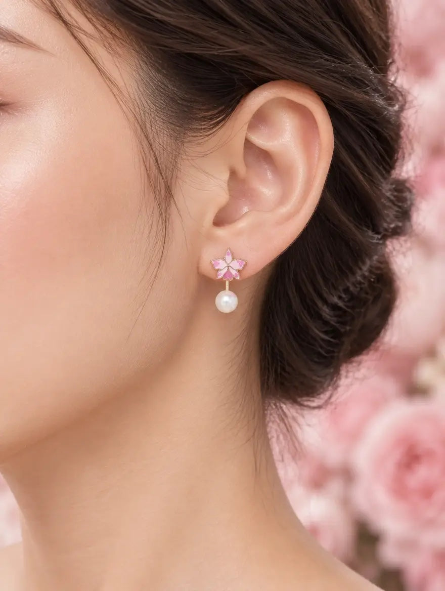 cattleya orchid stud earrings, pearl, pink enamel, 18K gold plated sterling silver, worn on model close-up – Orchidique