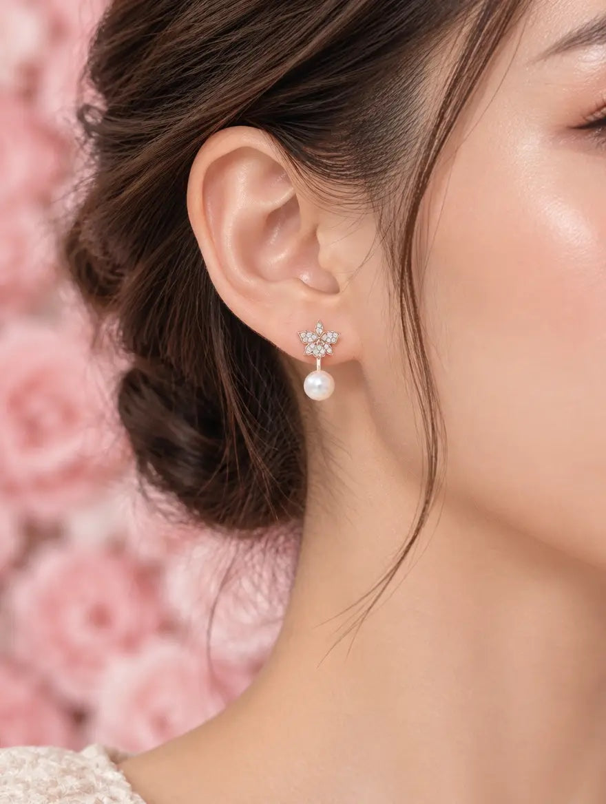 cattleya orchid stud earrings, pearl, 18K gold plated sterling silver, worn on model ear, tight crop – Orchidique
