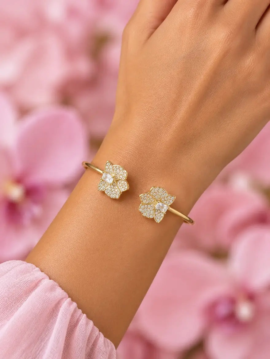dendrobium orchid bangle, shimmer, clear, 14K gold plated sterling silver, worn on wrist, hand raised – Orchidique