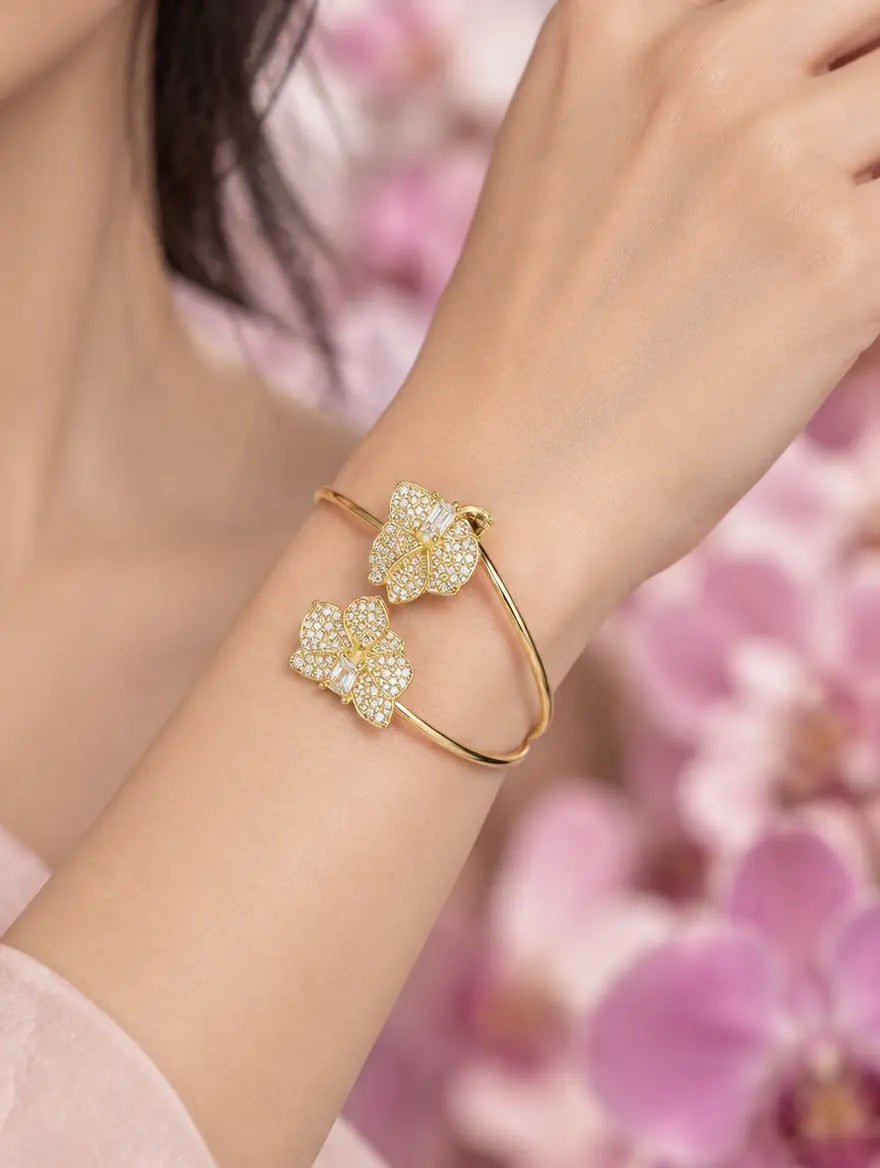 dendrobium orchid bangle, shimmer, clear, 14K gold plated sterling silver, worn on wrist with neckline – Orchidique