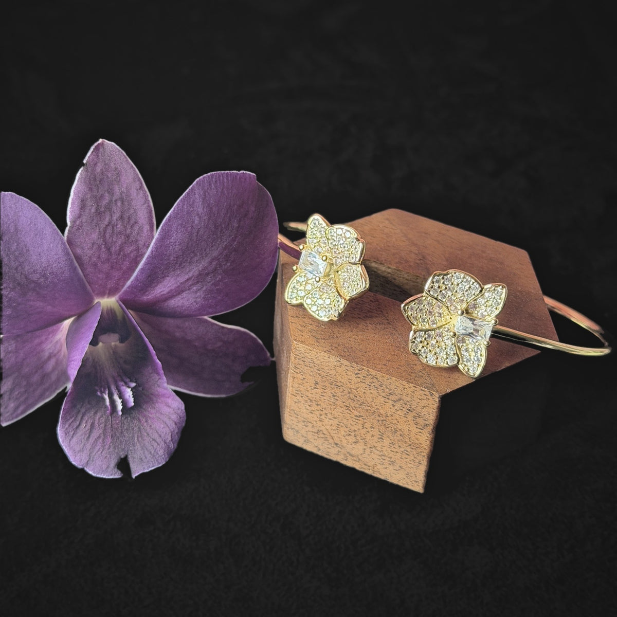 dendrobium orchid bangle, shimmer, clear, 14K gold plated sterling silver, on wood block with live orchid – Orchidique