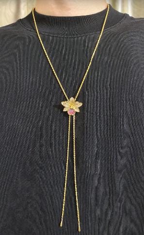 cattleya orchid necklace, 14K gold plated sterling silver, worn by model – Orchidique