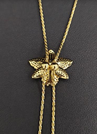 cattleya orchid necklace, 14K gold plated sterling silver, close-up on dark background – Orchidique