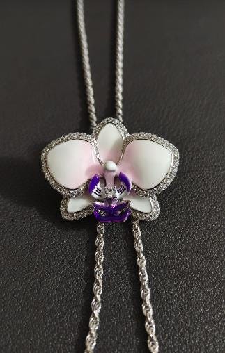 phalaenopsis orchid necklace, purple, rhodium plated sterling silver, lariat on dark background – Orchidique