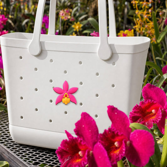 Cattleya Hot Pink Bag Charm, PVC orchid tote bag charm shown in use at true size, Orchidique