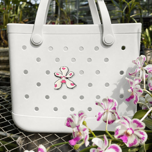 Vanda Bag Charm, PVC orchid tote bag charm shown in use at true size, Orchidique