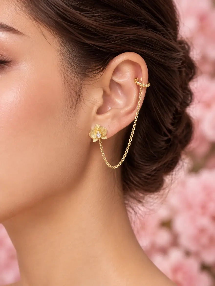 phalaenopsis orchid chain cuff, sterling silver, worn by model, close on ear – Orchidique