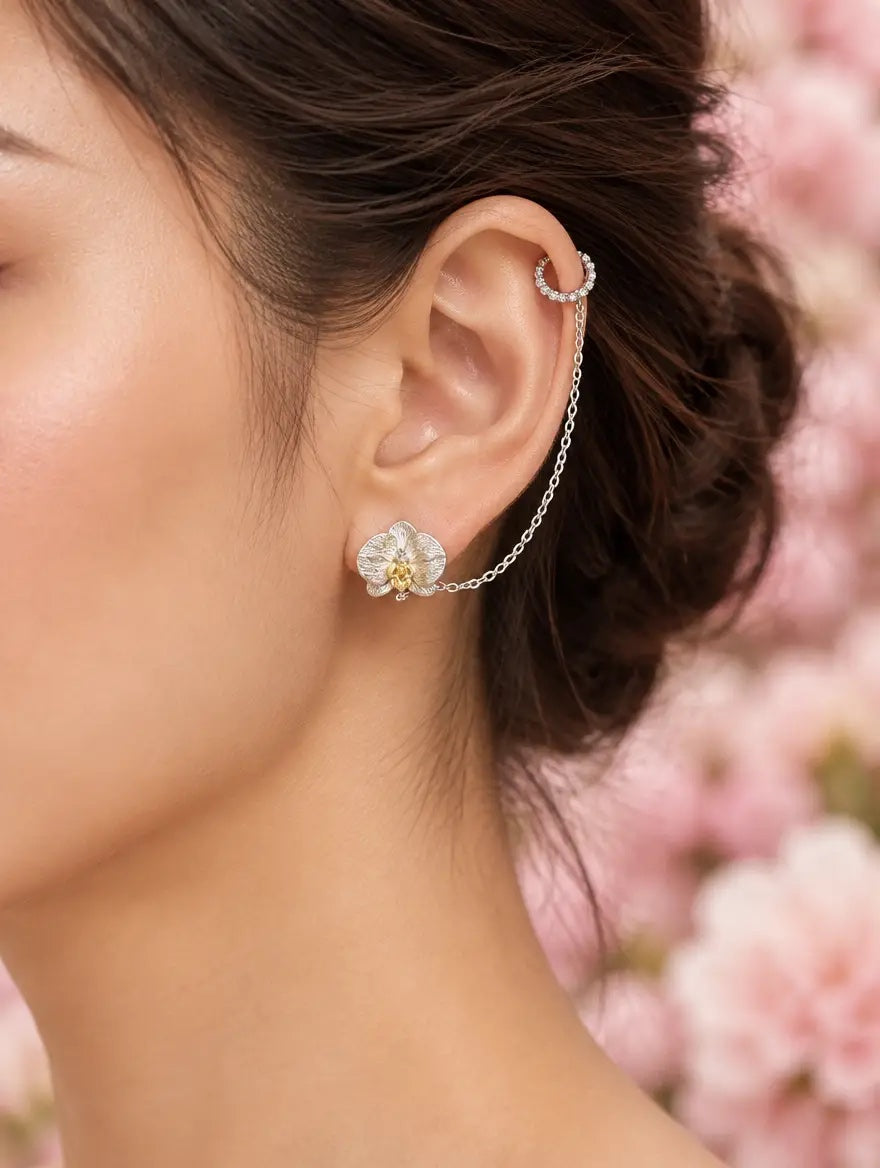 phalaenopsis orchid chain cuff, sterling silver, worn on model, back angle – Orchidique